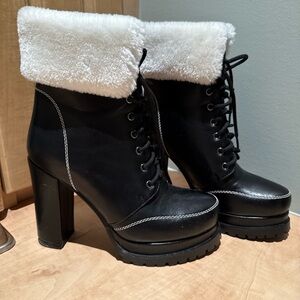 Elegant Black Heeled Boots with White Fur Trim